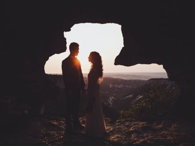 unusual-wedding-photography-sunset-in-muntains-with-silhouettes-newlyweds